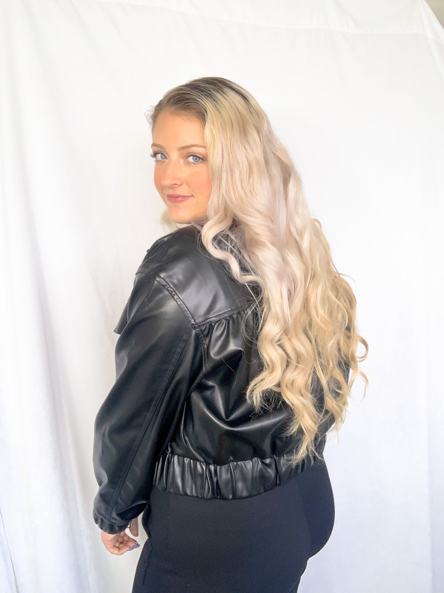 Black faux leather jacket with silver buttons